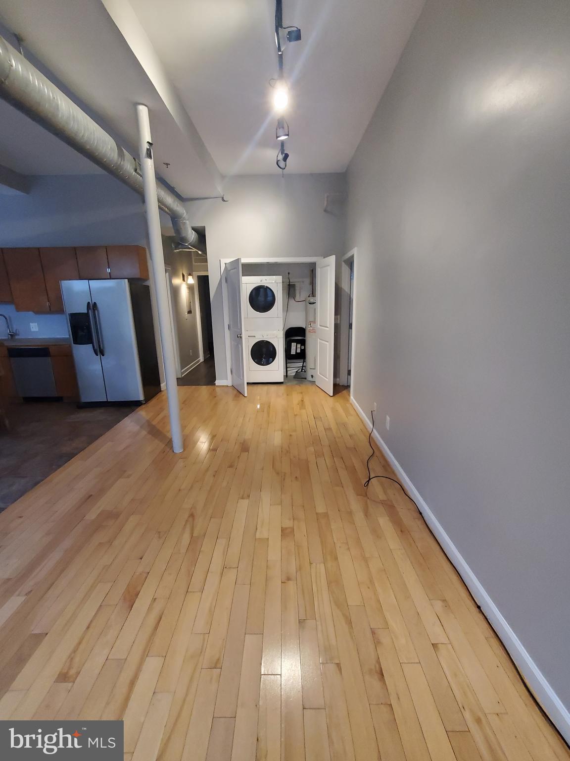 1211 South Charles Street, Unit 5 Baltimore, MD 21230 - Photo 6 of 16 Livingroom C and Washer-Dryer