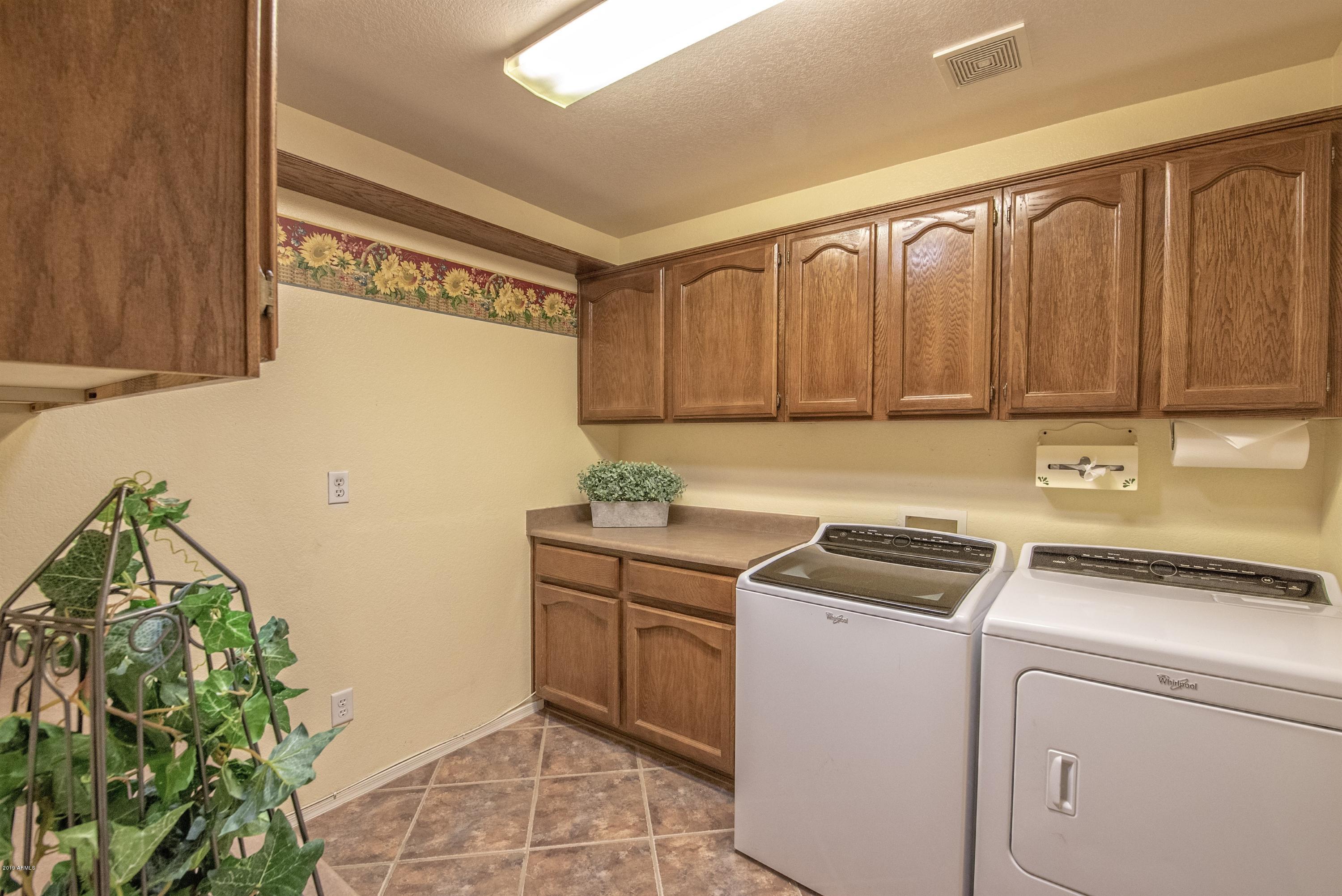 15651 Piccadilly Road Goodyear, AZ 85395 - Photo 7 of 18 008_Laundry Room