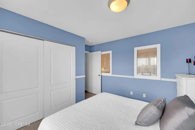 a view of a patio with a table and chairs