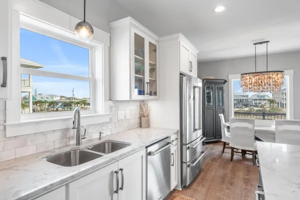 a spacious bedroom with a large bed and a couch