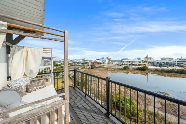a spacious bathroom with a double vanity sink mirror and bathtub