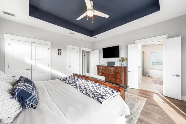 a white bath tub sitting in a bathroom