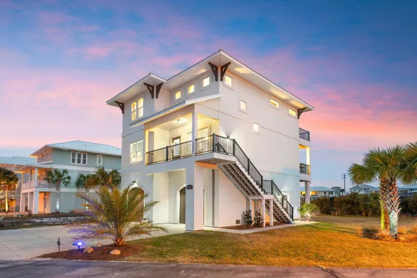 a view of a house with a swimming pool