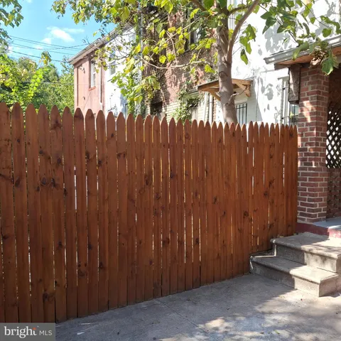 a view of a wooden fence