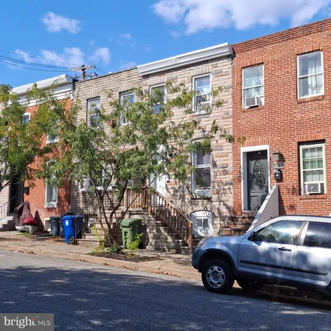 a car parked in front of a building