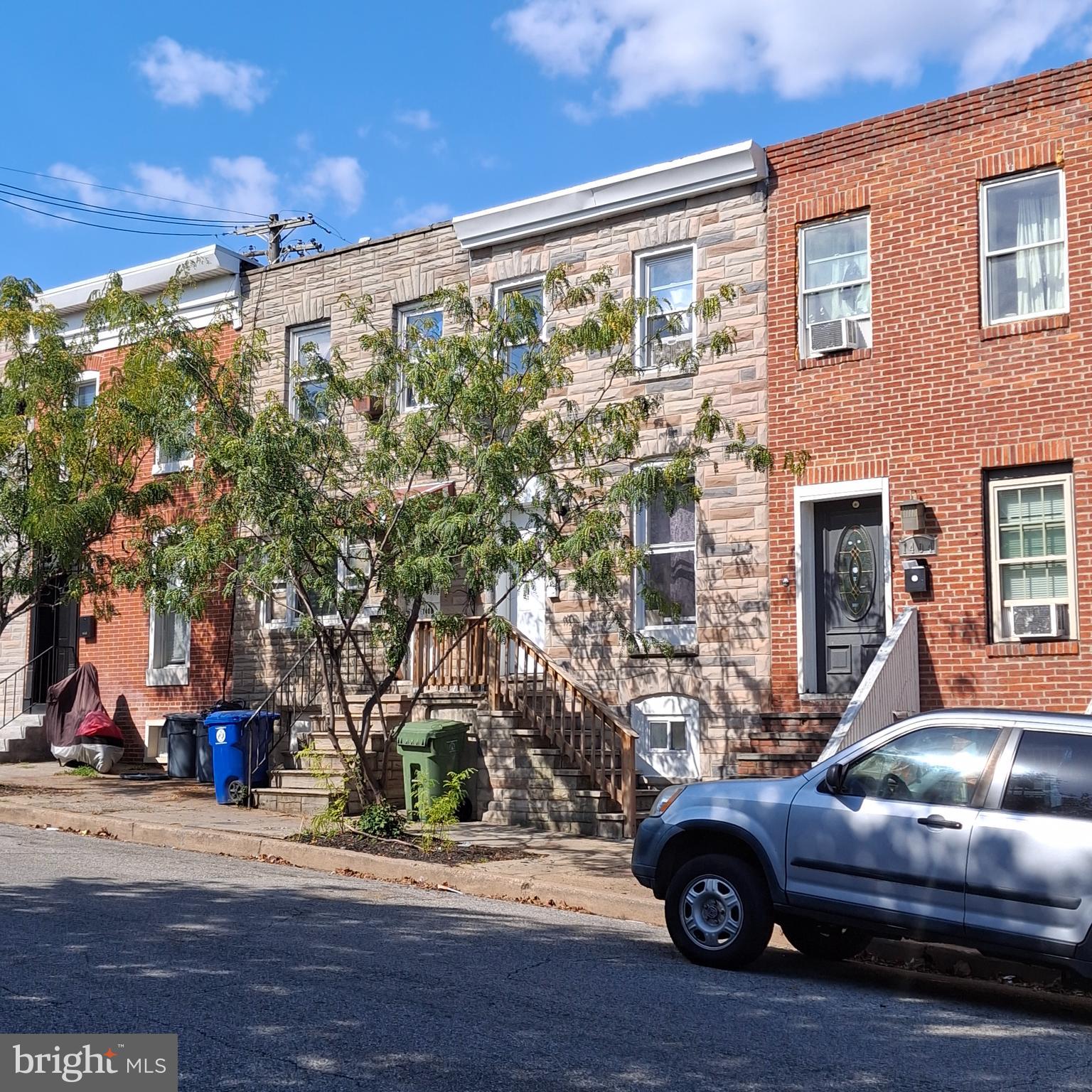 1403 Ramsay Street Baltimore, MD 21223 - Photo 14 of 30 a car parked in front of a building