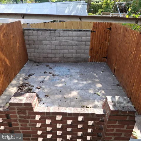 a view of outdoor space and wooden deck