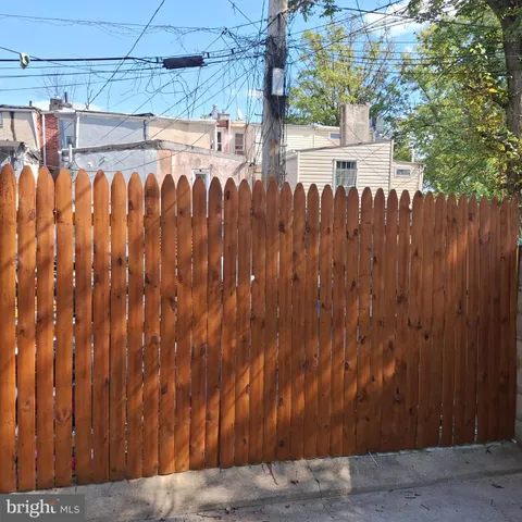 a view of a wooden fence