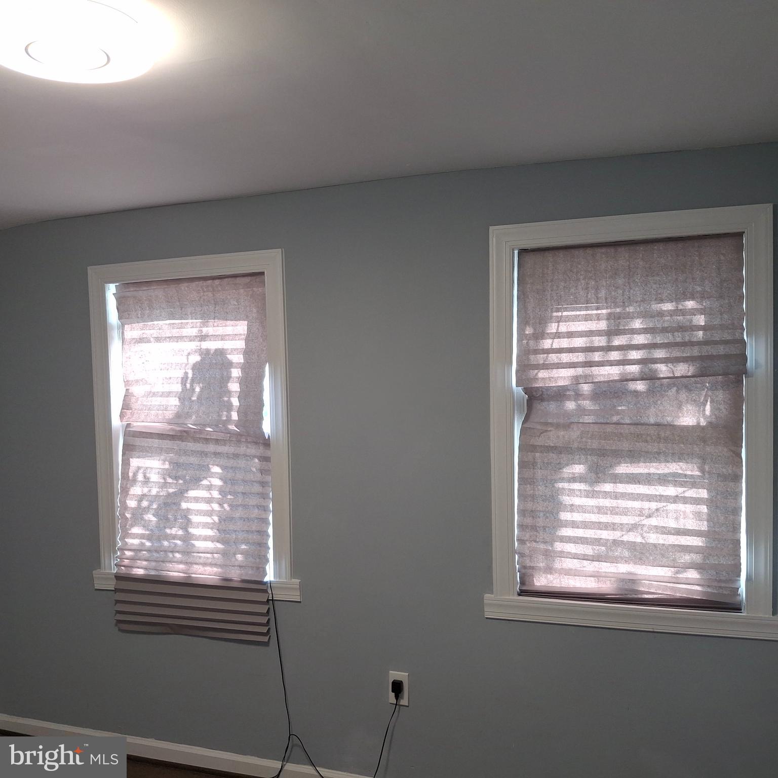 1403 Ramsay Street Baltimore, MD 21223 - Photo 5 of 30 a view of an empty room with a window
