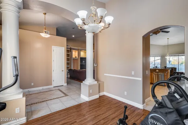 a view of a livingroom with a furniture and a ceiling fan