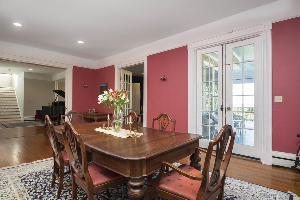 720 Jerusalem Road Cohasset, MA 02025 - Photo 20 of 29 a view of a dining room with furniture window and wooden floor