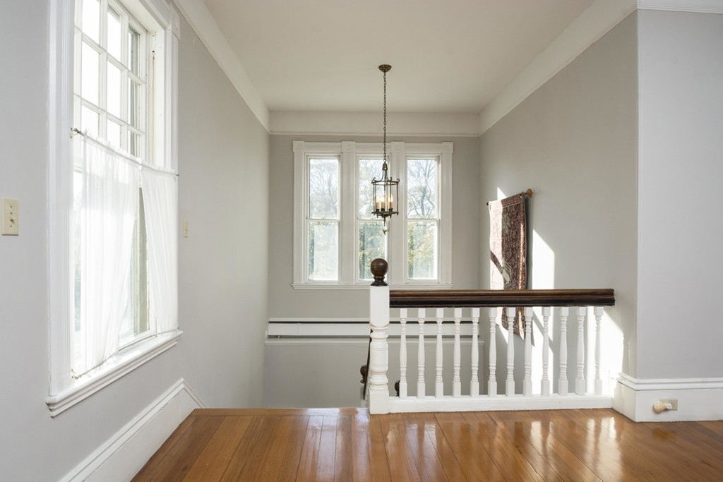 720 Jerusalem Road Cohasset, MA 02025 - Photo 22 of 29 a view of a room with wooden floor and windows