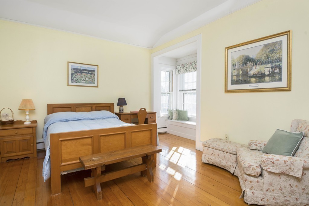 720 Jerusalem Road Cohasset, MA 02025 - Photo 25 of 29 a bedroom with furniture and wooden floor