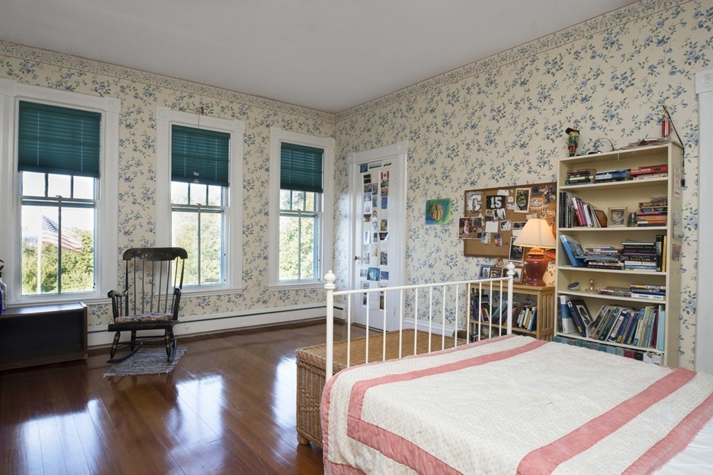 720 Jerusalem Road Cohasset, MA 02025 - Photo 27 of 29 a bedroom with furniture and a large window