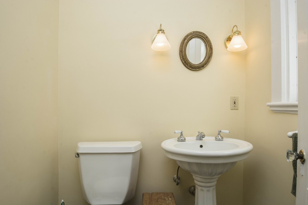 720 Jerusalem Road Cohasset, MA 02025 - Photo 29 of 29 a bathroom with a toilet sink and mirror