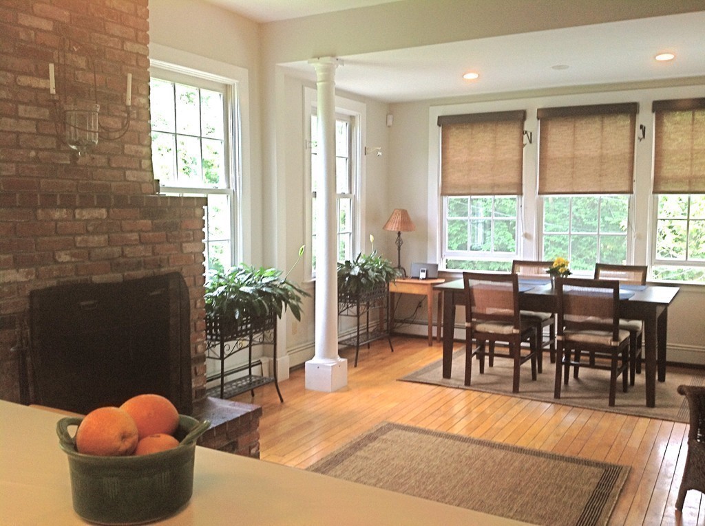 720 Jerusalem Road Cohasset, MA 02025 - Photo 6 of 29 a view of a dining room with furniture and a potted plant