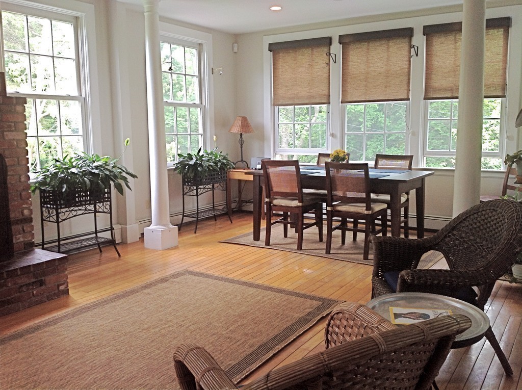 720 Jerusalem Road Cohasset, MA 02025 - Photo 8 of 29 a dining room with furniture window and wooden floor