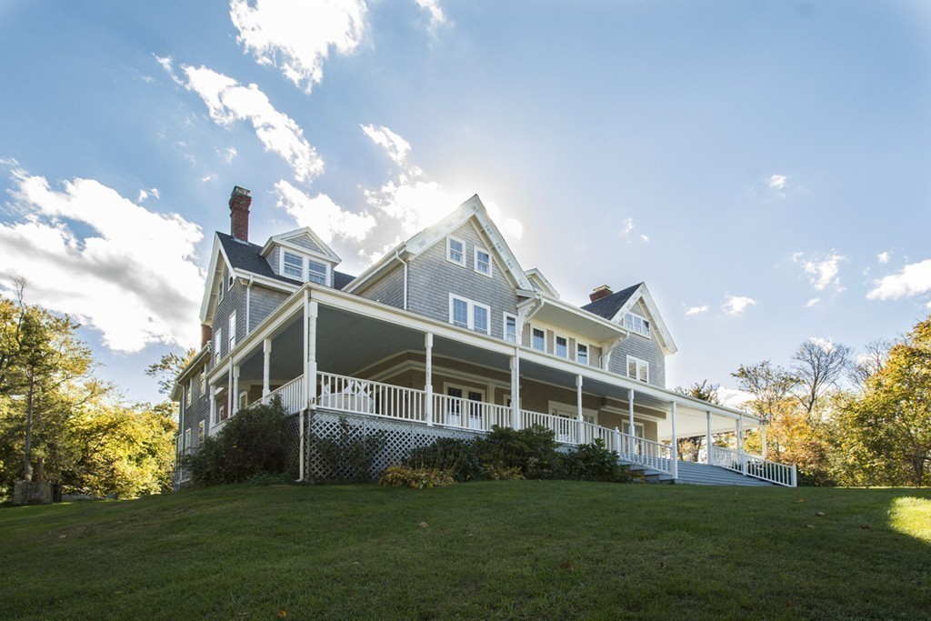720 Jerusalem Road Cohasset, MA 02025 - Photo 9 of 29 a view of a house next to a big yard and large trees