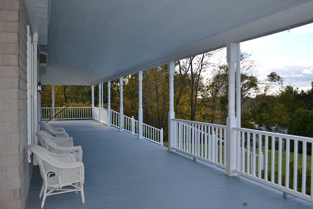 720 Jerusalem Road Cohasset, MA 02025 - Photo 10 of 29 a view of a two chair in the balcony