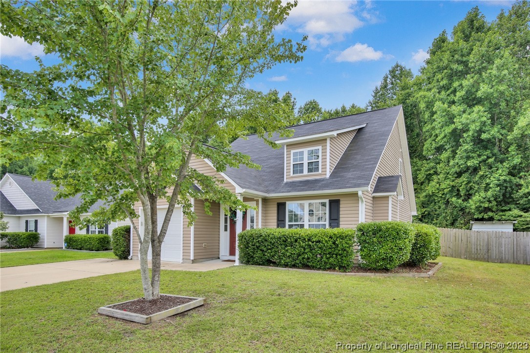 234 Cape Fear Road Raeford, NC 28376 - Photo 19 of 33 a front view of a house with a yard