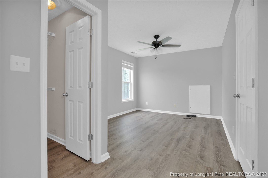 234 Cape Fear Road Raeford, NC 28376 - Photo 21 of 33 wooden floor in an empty room with a window