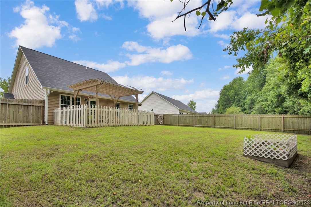 234 Cape Fear Road Raeford, NC 28376 - Photo 29 of 33 a view of a house with a big yard
