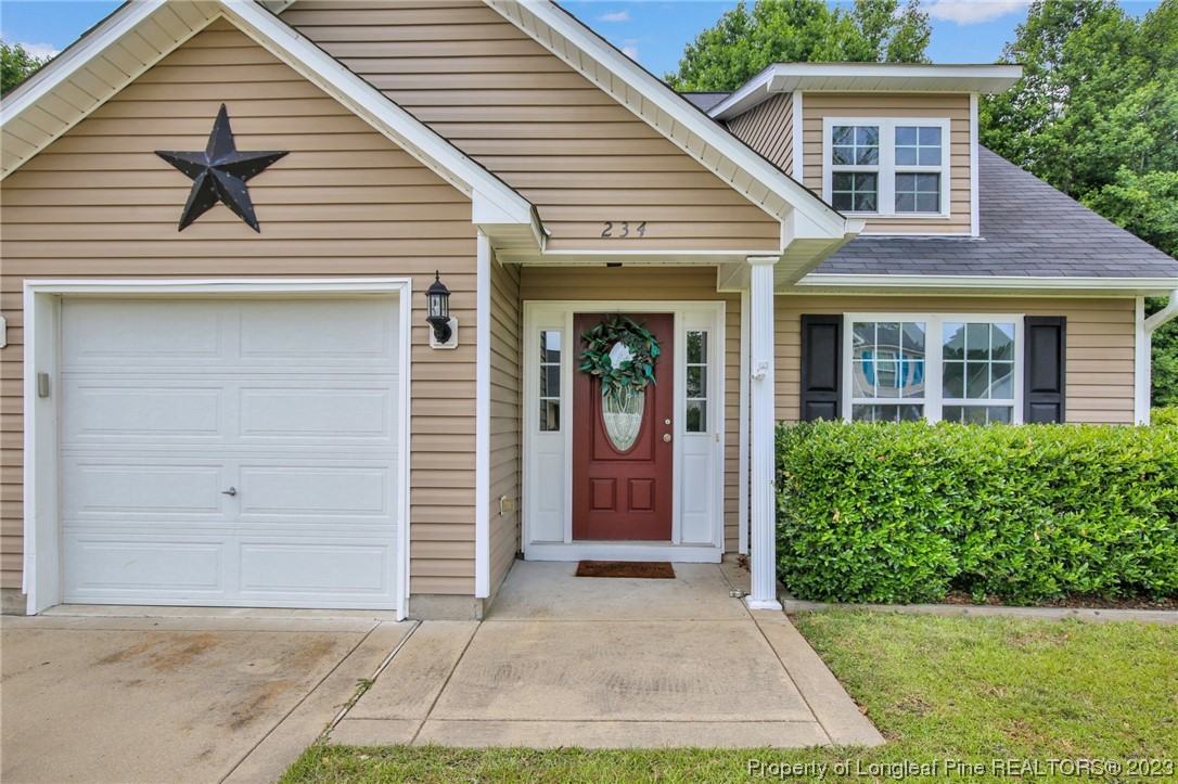 234 Cape Fear Road Raeford, NC 28376 - Photo 32 of 33 a view of a house with a yard
