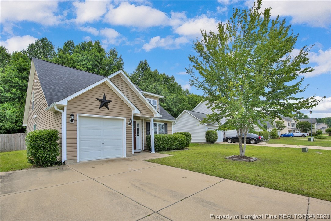 234 Cape Fear Road Raeford, NC 28376 - Photo 33 of 33 a front view of a house with a yard