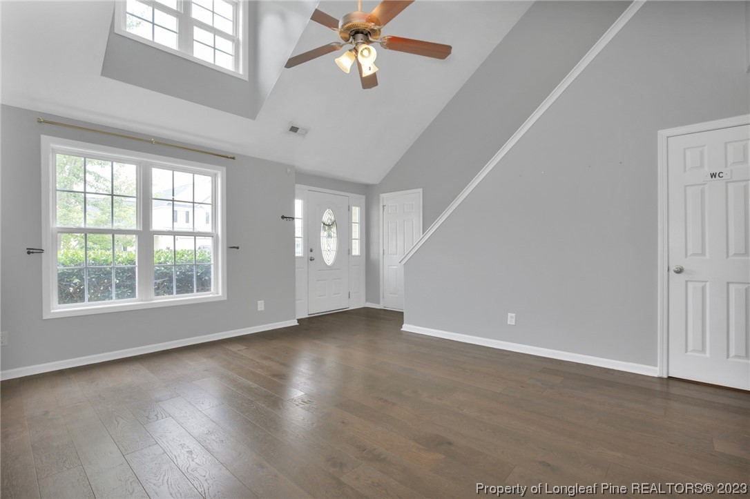 234 Cape Fear Road Raeford, NC 28376 - Photo 4 of 33 a view of an empty room with wooden floor and a window