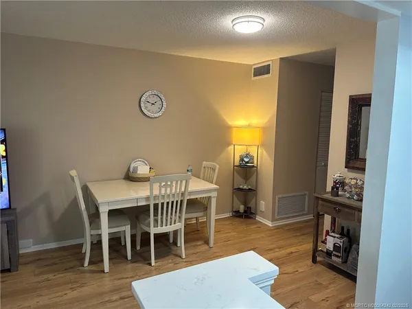 a view of a dining room with furniture