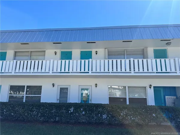 a view of a house with a deck