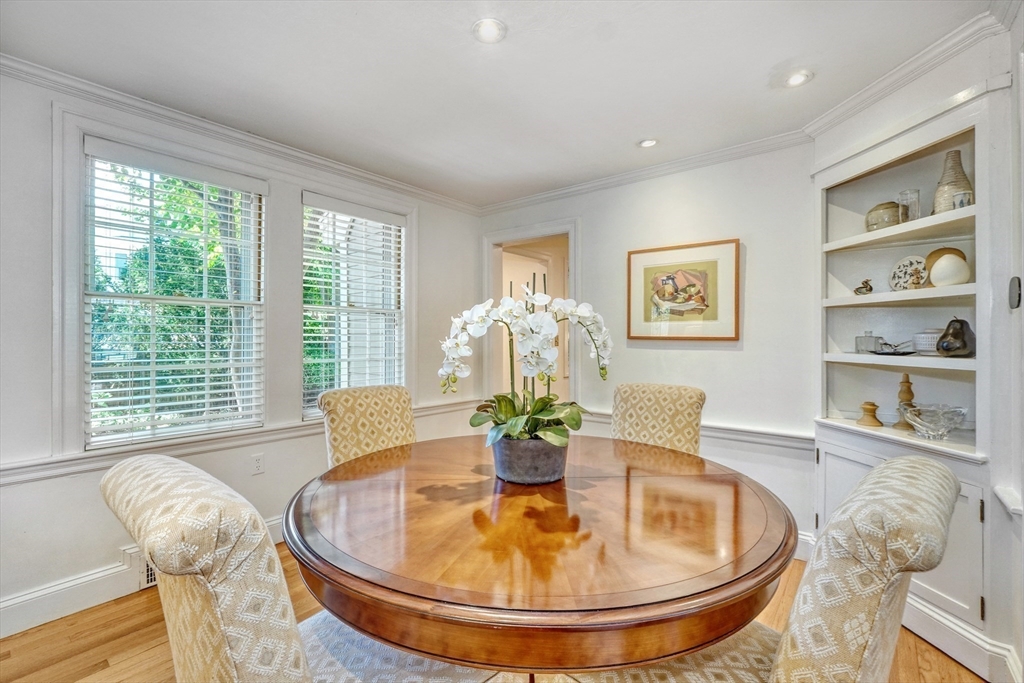 21 Philbrick Road Newton, MA 02459 - Photo 11 of 35 a dining room with furniture and wooden floor