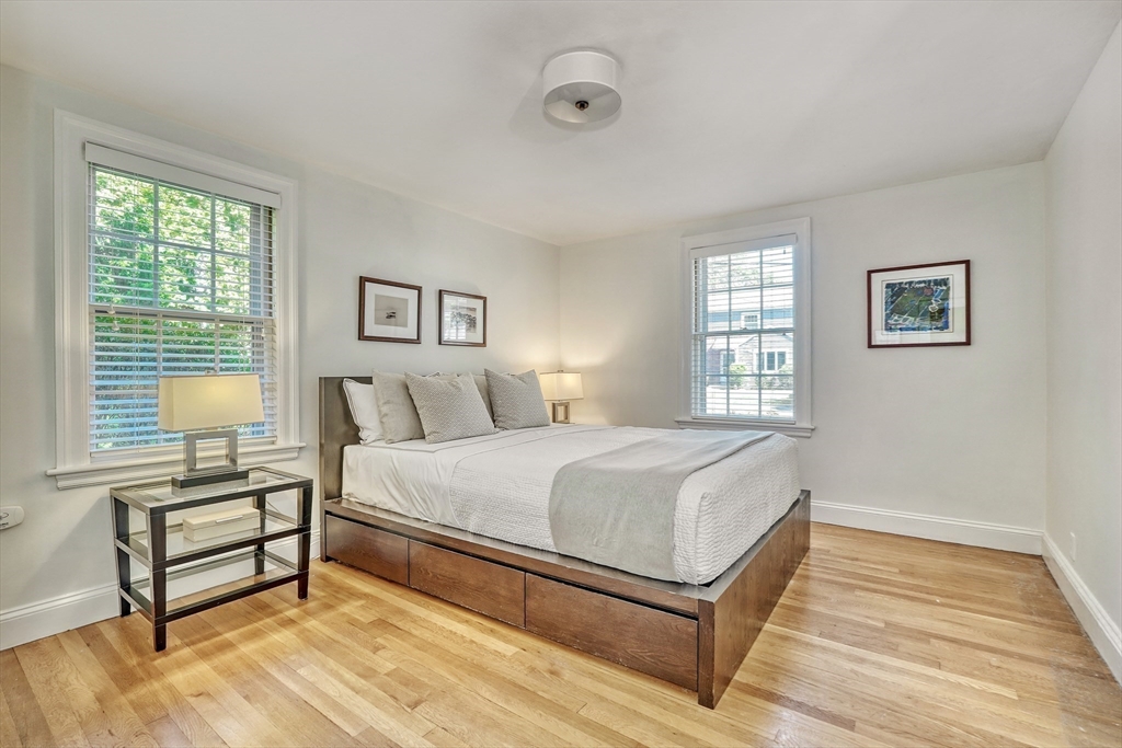 21 Philbrick Road Newton, MA 02459 - Photo 19 of 35 a bedroom with a bed and a table