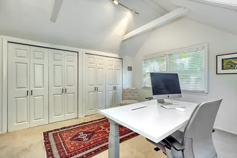 a view of a livingroom with furniture