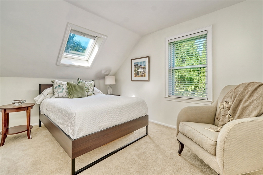 21 Philbrick Road Newton, MA 02459 - Photo 22 of 35 a bedroom with a bed couch and window