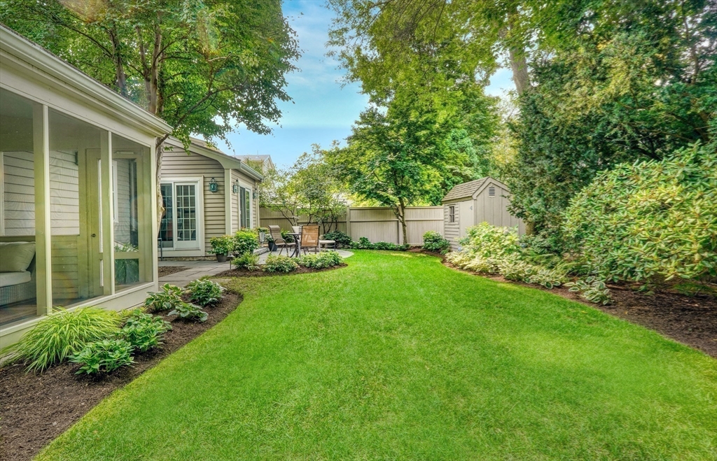 21 Philbrick Road Newton, MA 02459 - Photo 25 of 35 a view of backyard of house with green space