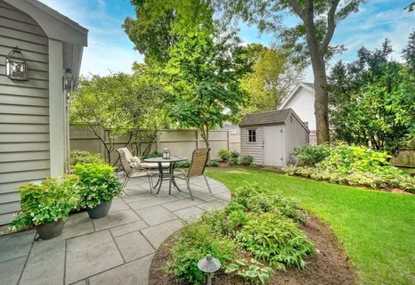 a garden view with a seating space