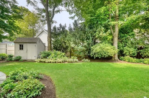 a view of a house with a garden