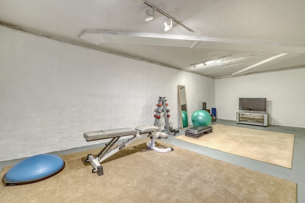 21 Philbrick Road Newton, MA 02459 - Photo 32 of 35 a view of a room with gym equipment