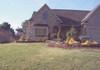 365 W Road Lee, MA 01238 - Photo 1 of 3 a front view of house with yard