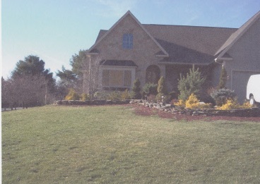 365 W Road Lee, MA 01238 - Photo 2 of 3 a view of a house with a yard