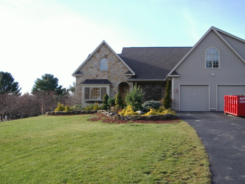 365 W Road Lee, MA 01238 - Photo 3 of 3 a view of a house with backyard sitting area and garden