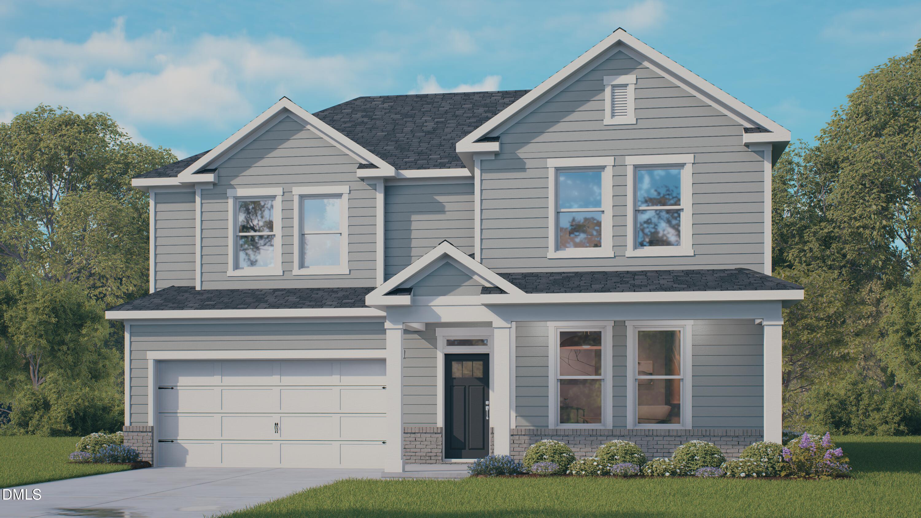 2229 Redpoll Drive Apex, NC 27539 - Photo 1 of 25 a front view of a house with garden