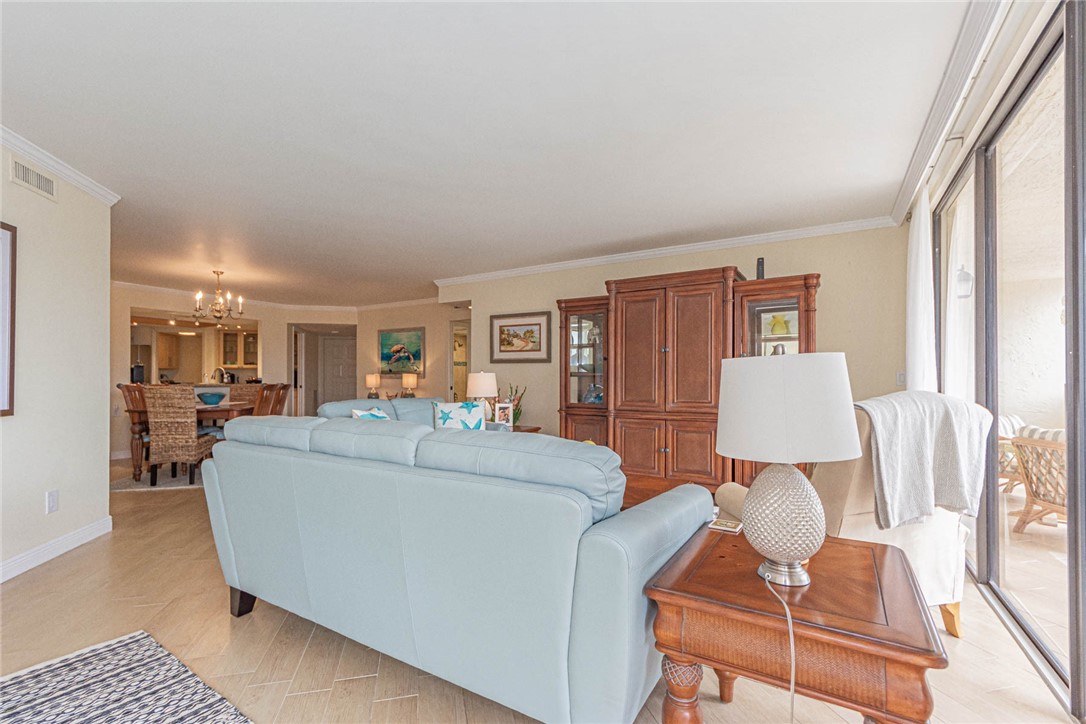 1850 Bay Road, Unit 3G Vero Beach, FL 32963 - Photo 12 of 36 a living room with furniture and a flat screen tv