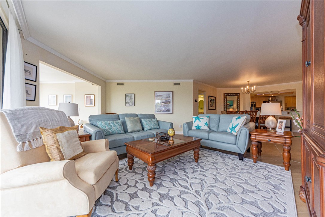 1850 Bay Road, Unit 3G Vero Beach, FL 32963 - Photo 13 of 36 a living room with furniture and a rug