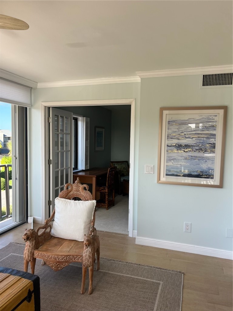 1850 Bay Road, Unit 3G Vero Beach, FL 32963 - Photo 19 of 36 a living room with furniture and a window