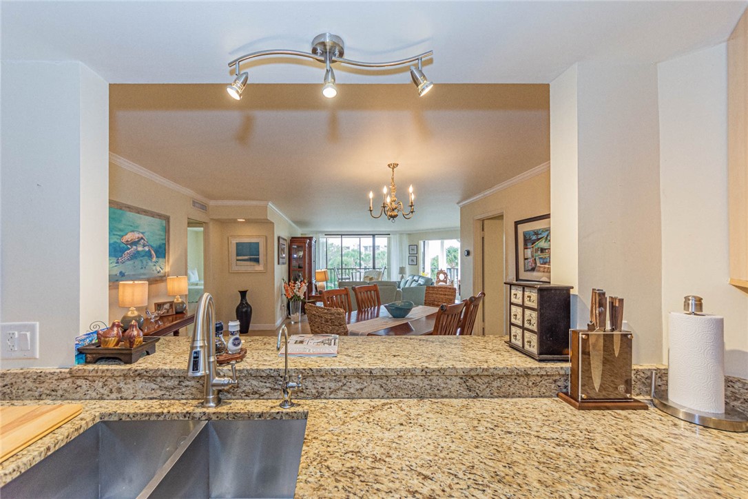 1850 Bay Road, Unit 3G Vero Beach, FL 32963 - Photo 22 of 36 a view of a livingroom with furniture and a fireplace