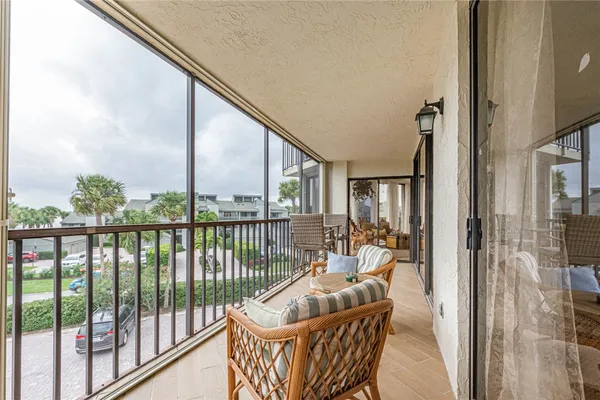 a balcony with furniture