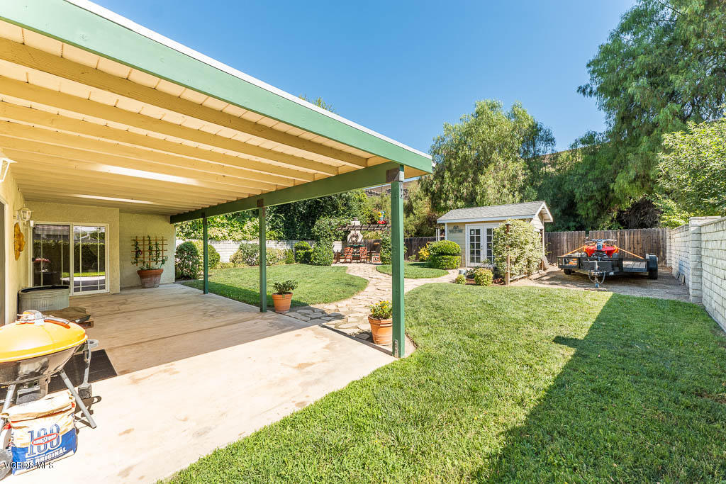 4243 Apricot Road Simi Valley, CA 93063 - Photo 22 of 33 a view of a house with backyard and a slide