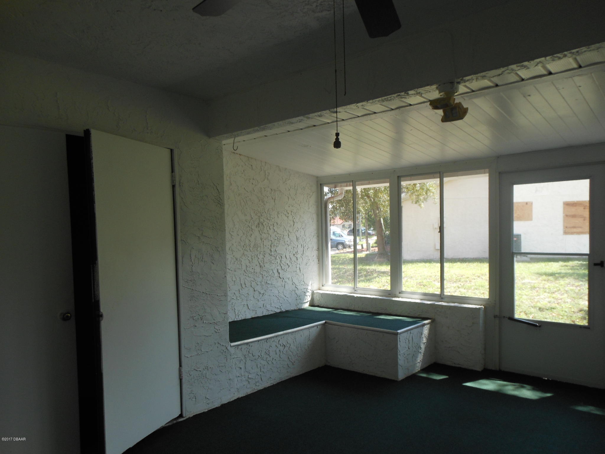 3544 Creekside Road, Unit D Port Orange, FL 32129 - Photo 6 of 14 Enclosed Rear Porch with storage